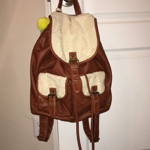 Leather and lace backpack